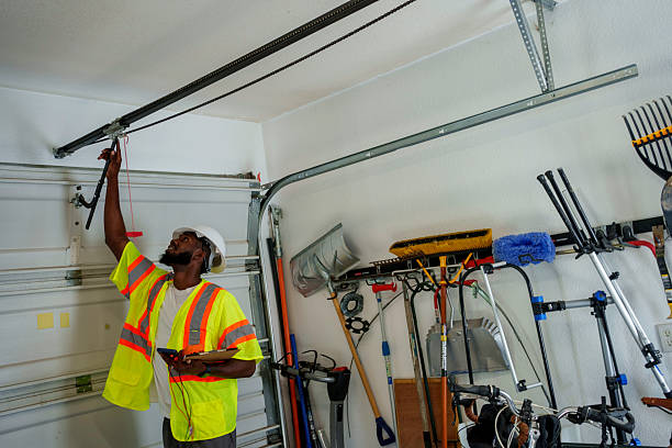 Professional Garage Door Panel Replacement technician working in Douglas, AL